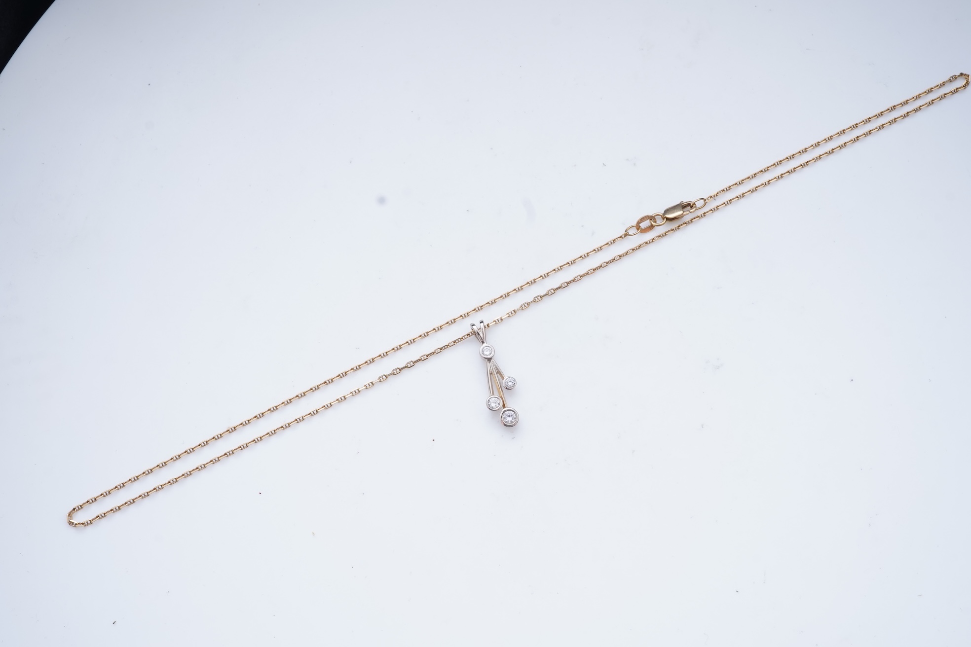 A diamond pendant necklace